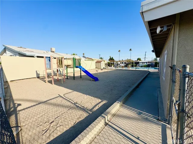 a terrace with outdoor seating and city view