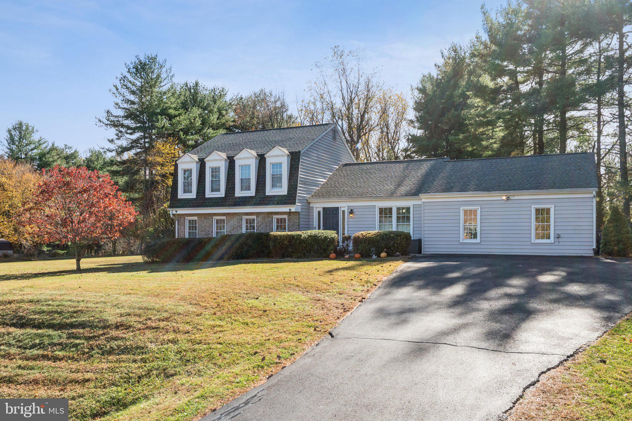 8124 Seneca View Drive Gaithersburg, MD 20882 - Photo 2 of 37 a front view of a house with a yard