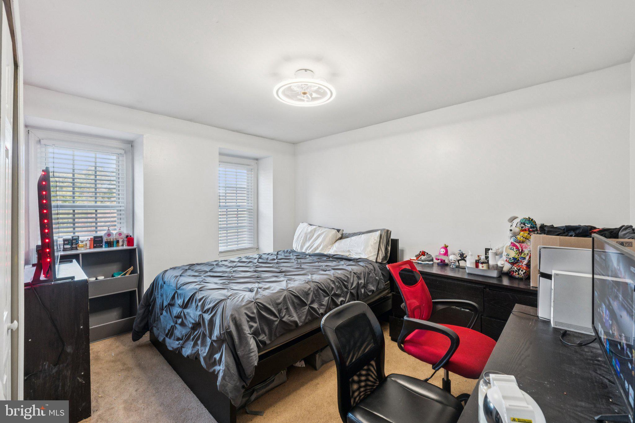 8124 Seneca View Drive Gaithersburg, MD 20882 - Photo 27 of 37 a bedroom with a bed and furniture