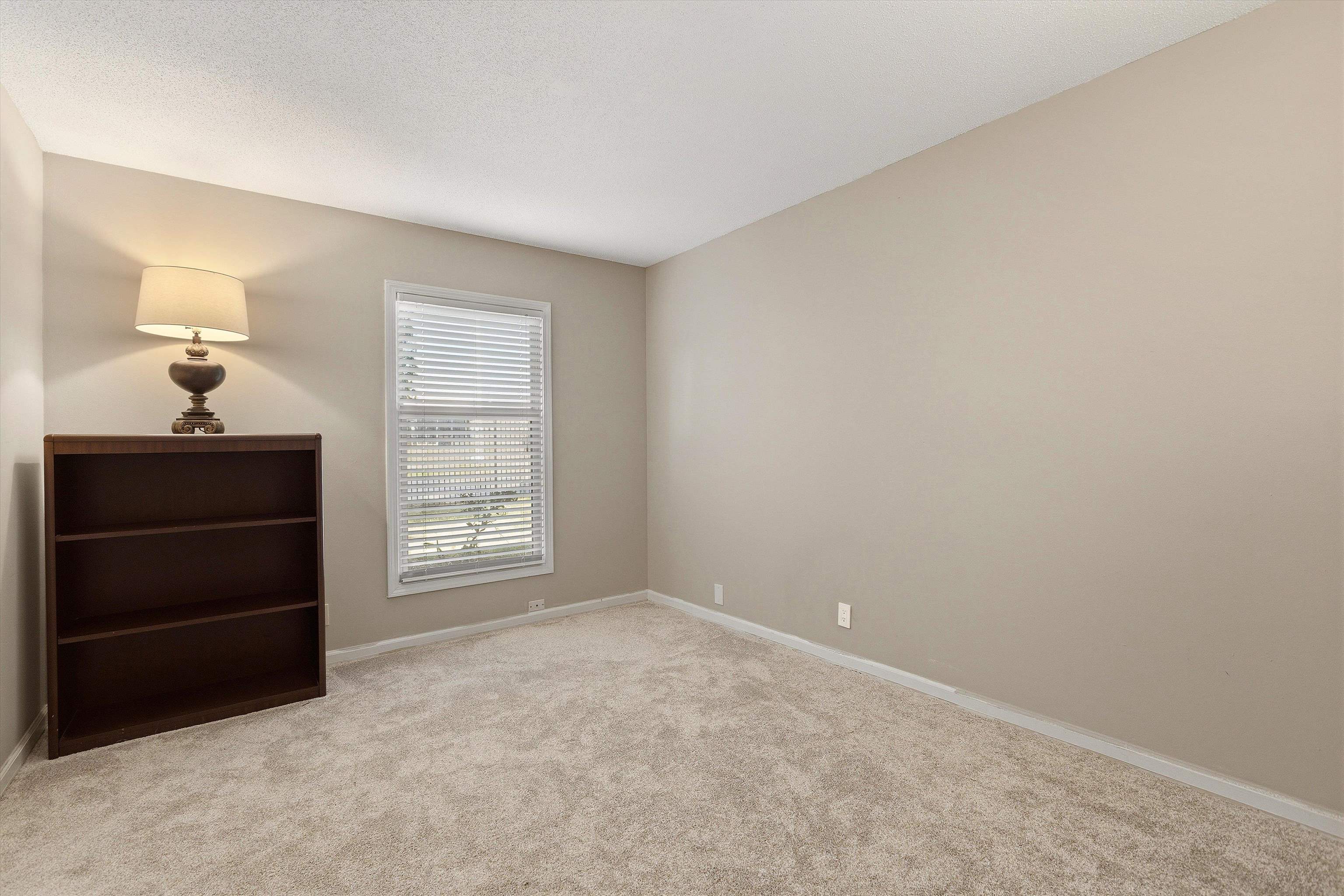 1184 Lynnfield Road, Unit 1 Memphis, TN 38119 - Photo 21 of 28 New window and carpet in Bedroom 3.