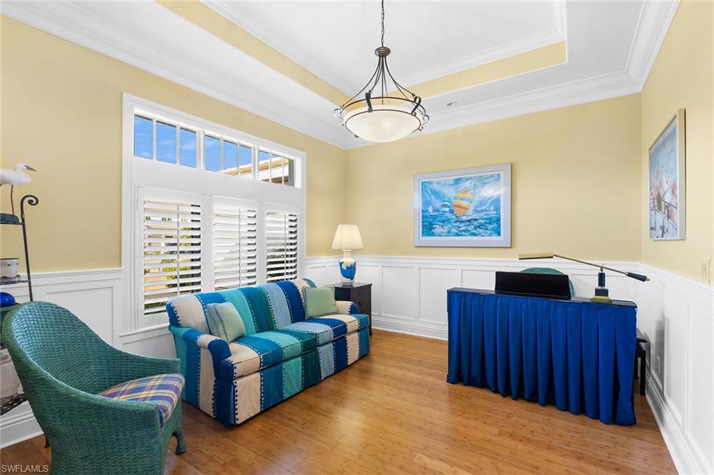 540 Ketch Drive Naples, FL 34103 - Photo 11 of 32 a living room with furniture and a window