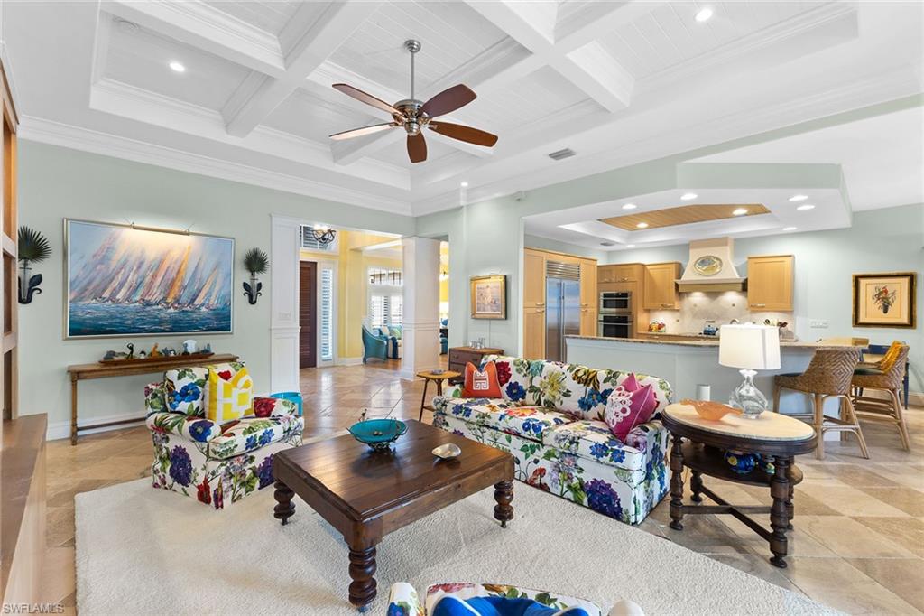 540 Ketch Drive Naples, FL 34103 - Photo 19 of 32 a living room with furniture and kitchen view