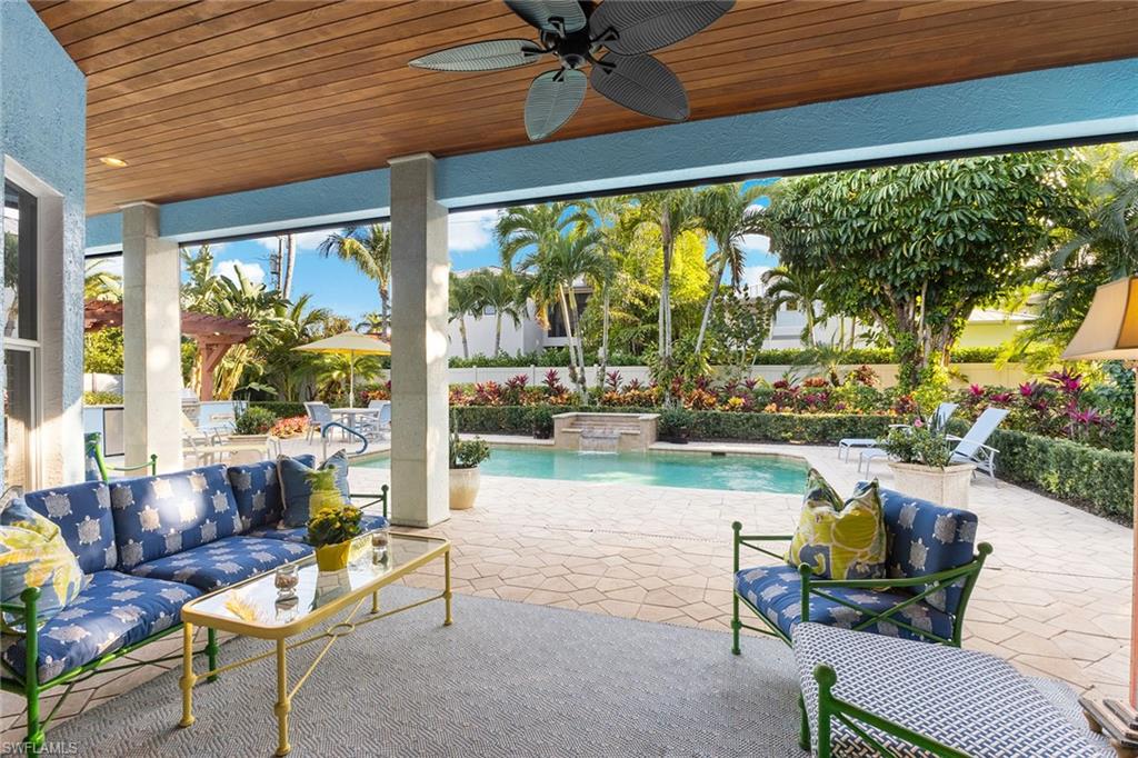 540 Ketch Drive Naples, FL 34103 - Photo 20 of 32 a living room filled with furniture