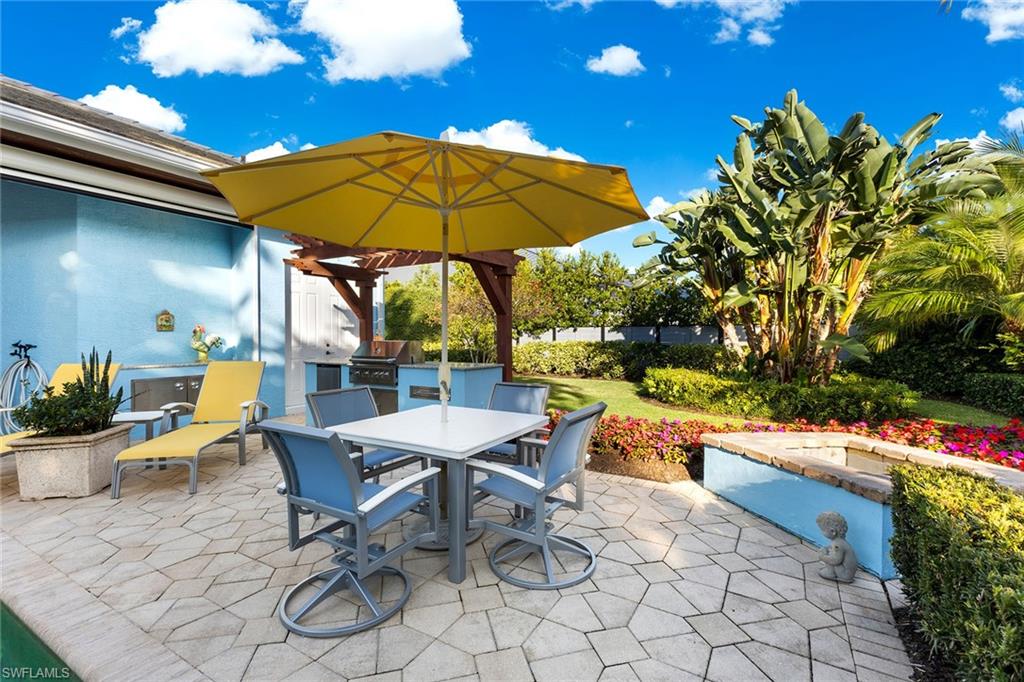 540 Ketch Drive Naples, FL 34103 - Photo 25 of 32 a outdoor view with a sitting space