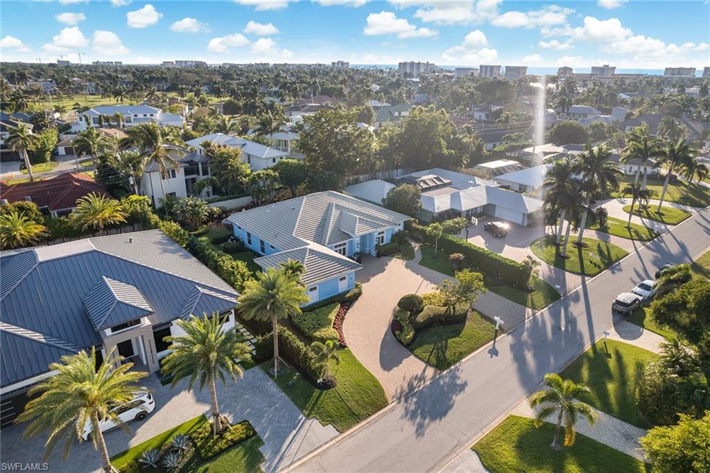 540 Ketch Drive Naples, FL 34103 - Photo 28 of 32 an aerial view of residential houses with outdoor space