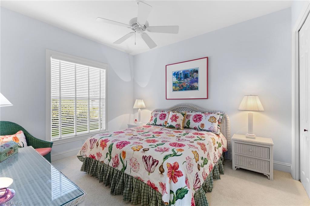 540 Ketch Drive Naples, FL 34103 - Photo 6 of 32 a bedroom with bed and a window