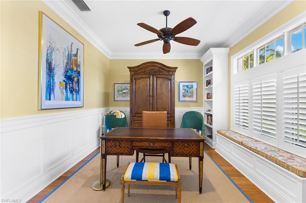 540 Ketch Drive Naples, FL 34103 - Photo 10 of 32 a living room with furniture and a window