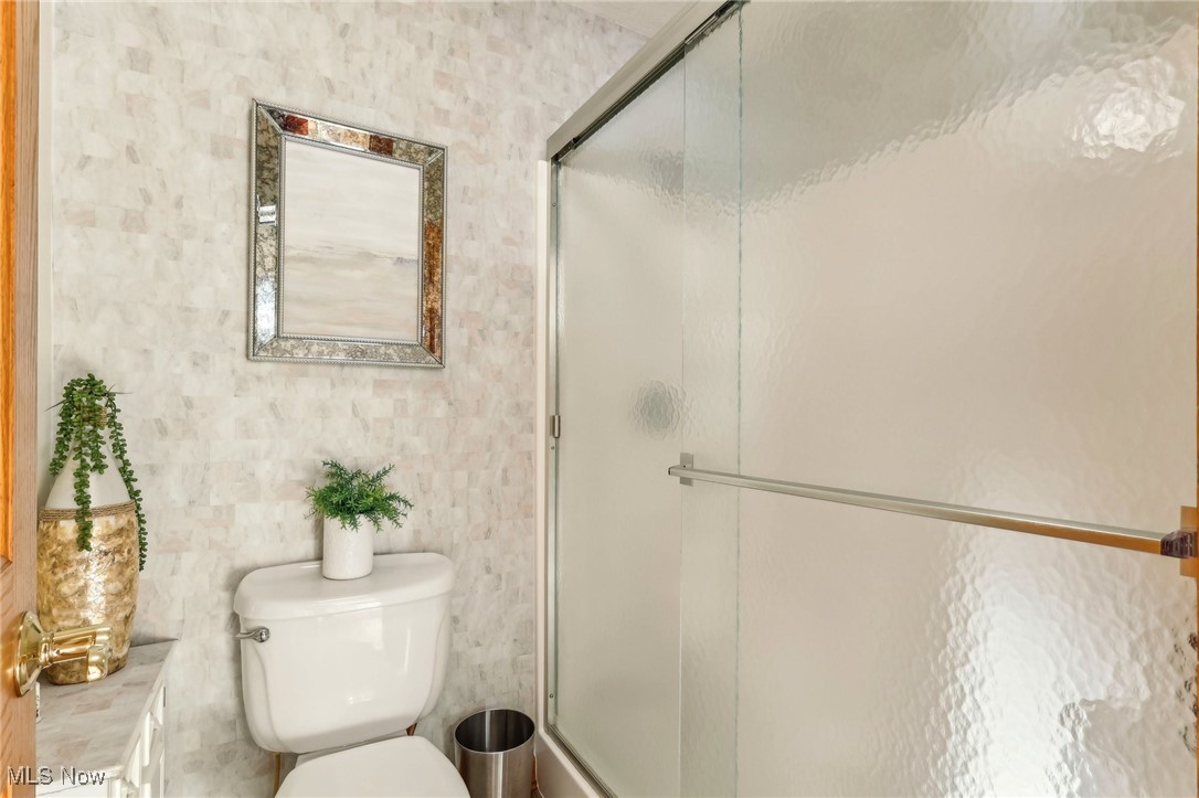 3353 Jens Way Perry, OH 44081 - Photo 42 of 49 Bathroom featuring a shower with shower door and toilet
