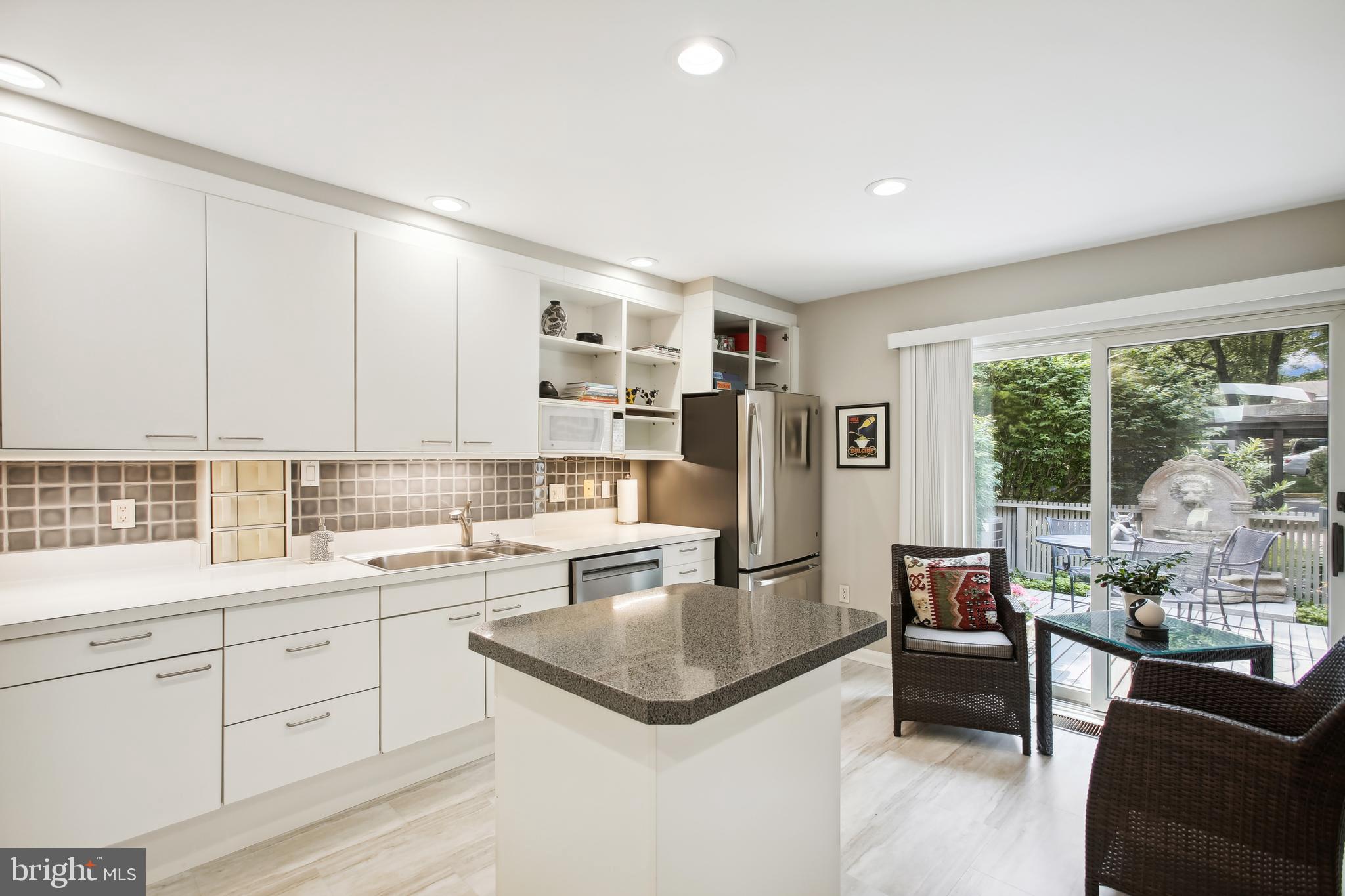 11436 Links Drive Reston, VA 20190 - Photo 4 of 38 Kitchen view of island and view of courtyard