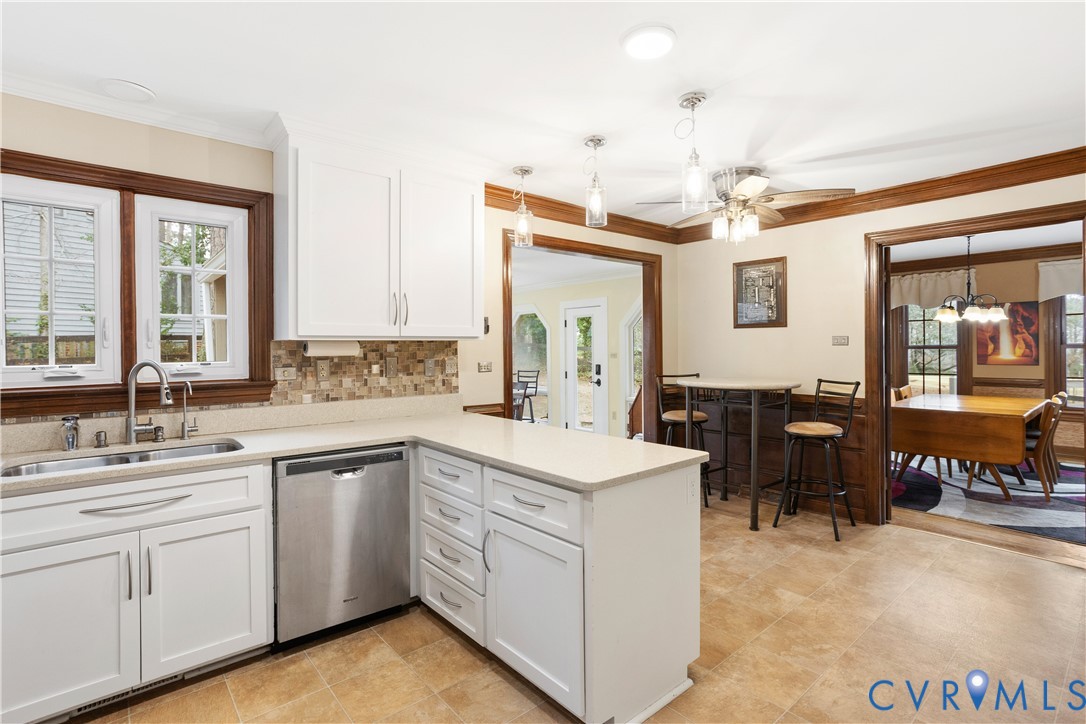 3613 Stoney Ridge Road Midlothian, VA 23112 - Photo 15 of 50 a kitchen with a sink stove and cabinets