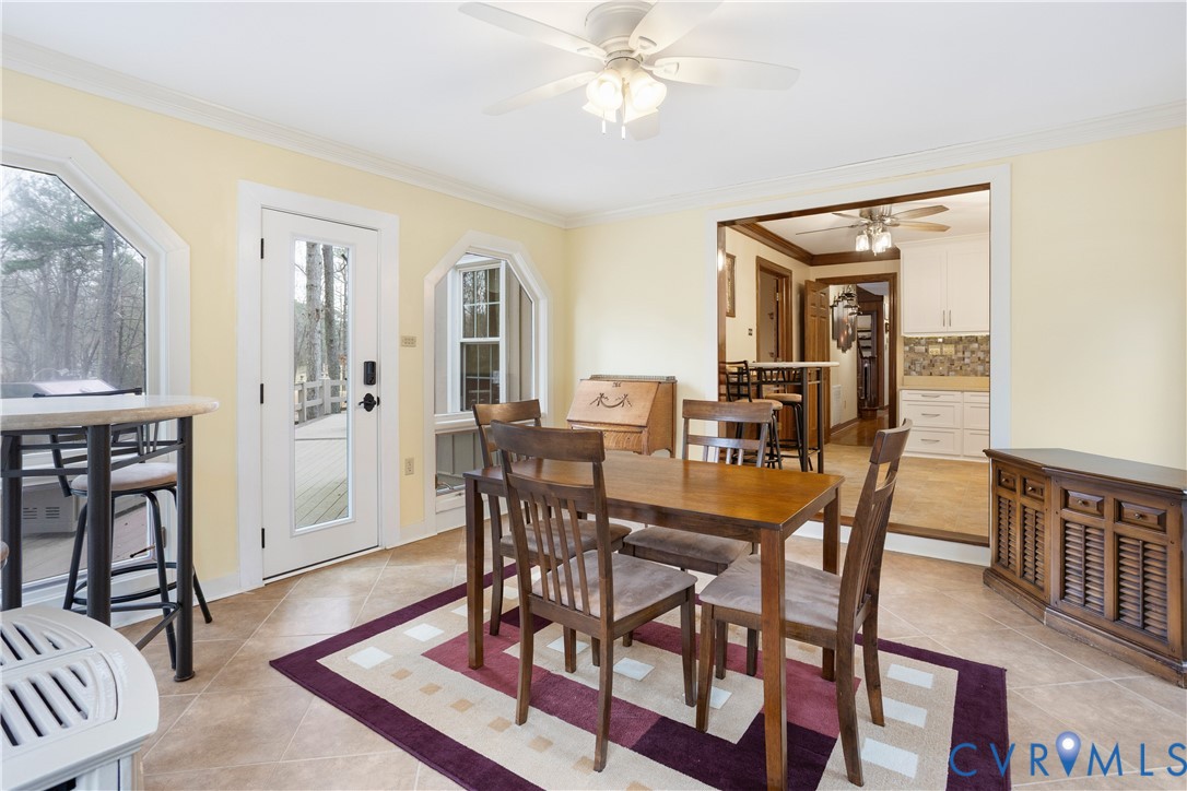3613 Stoney Ridge Road Midlothian, VA 23112 - Photo 19 of 50 a view of a dining room with furniture and wooden floor