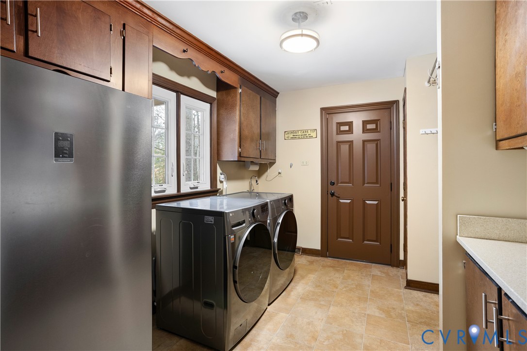3613 Stoney Ridge Road Midlothian, VA 23112 - Photo 22 of 50 a utility room with dryer and washer