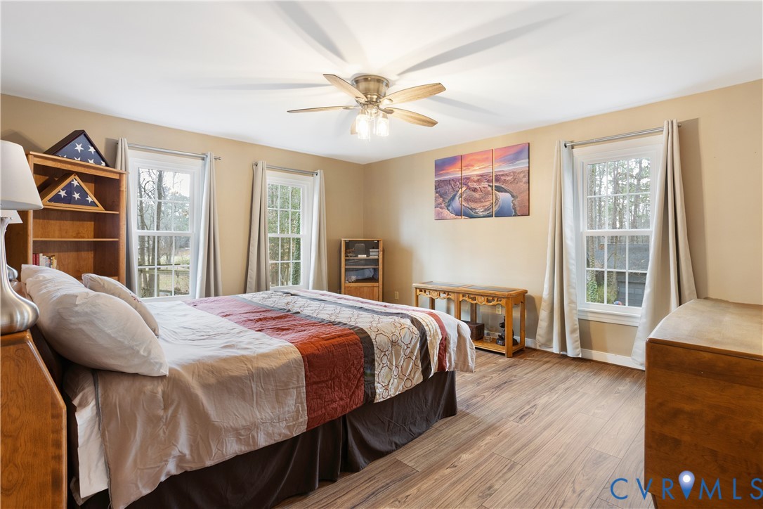 3613 Stoney Ridge Road Midlothian, VA 23112 - Photo 23 of 50 a bedroom with a bed and a large window