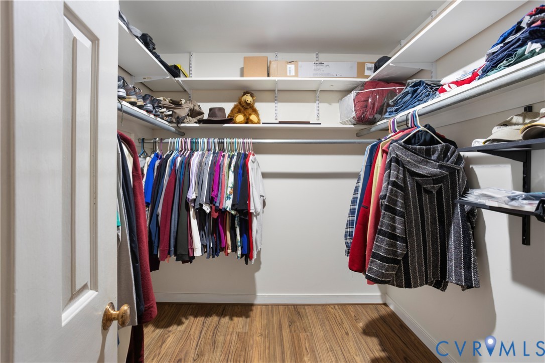 3613 Stoney Ridge Road Midlothian, VA 23112 - Photo 24 of 50 a view of walk in closet with clothes and shoes