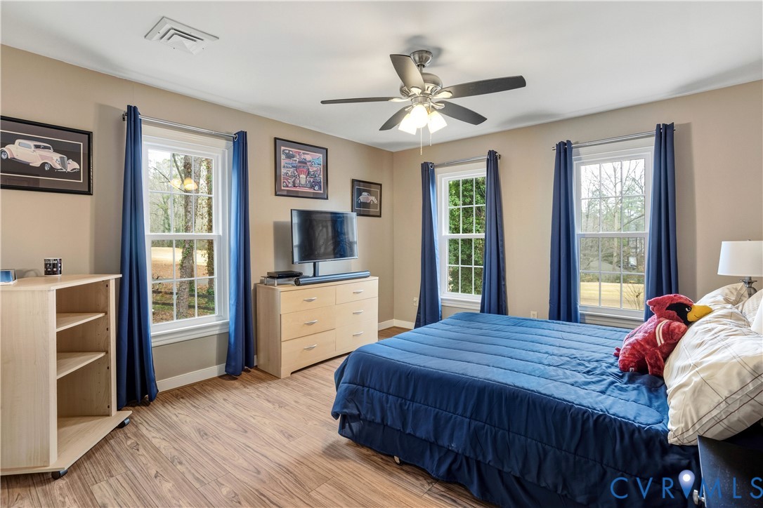 3613 Stoney Ridge Road Midlothian, VA 23112 - Photo 32 of 50 a bedroom with a large bed and a window