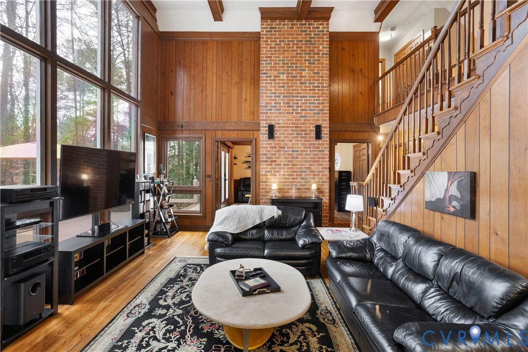 3613 Stoney Ridge Road Midlothian, VA 23112 - Photo 8 of 50 a living room with furniture a flat screen tv and a fireplace