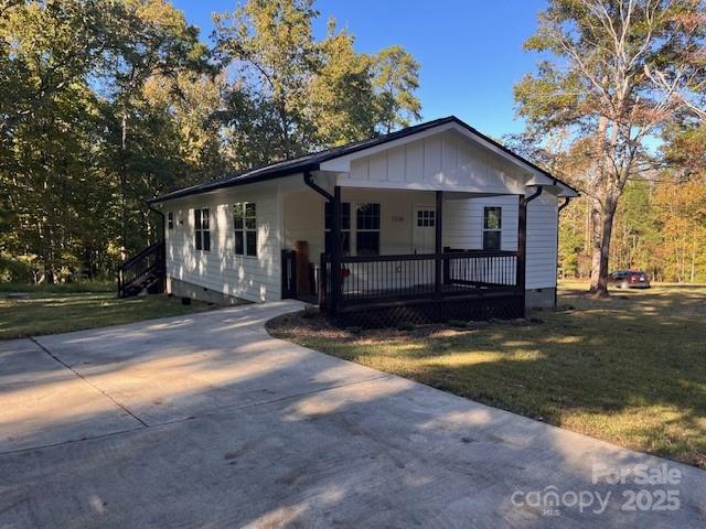 2538 Gemena Road Chapel Hill, NC 27516 - Photo 11 of 21 a view of a house with yard and large trees