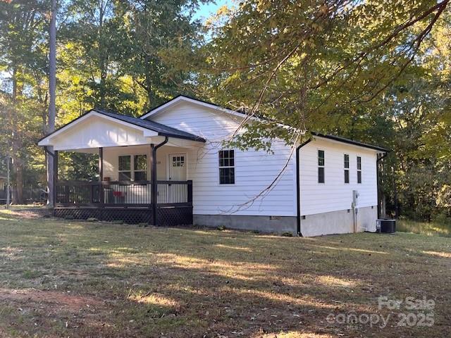 2538 Gemena Road Chapel Hill, NC 27516 - Photo 20 of 21 a front view of a house with a garden and yard