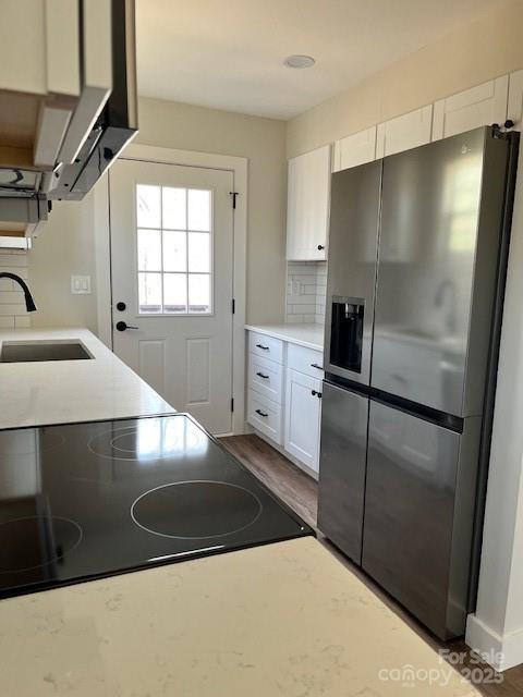 2538 Gemena Road Chapel Hill, NC 27516 - Photo 3 of 21 a view of a refrigerator in kitchen and a sink