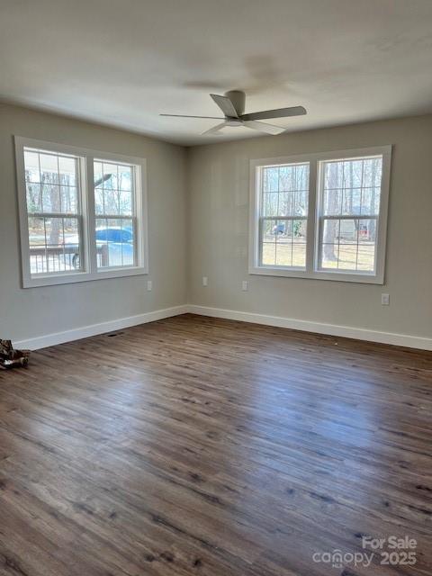 2538 Gemena Road Chapel Hill, NC 27516 - Photo 6 of 21 a view of an empty room with wooden floor and a window