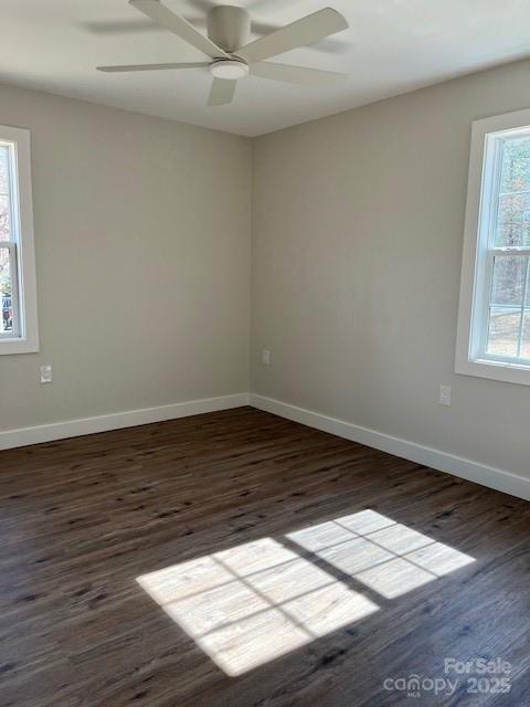 2538 Gemena Road Chapel Hill, NC 27516 - Photo 8 of 21 an empty room with wooden floor and windows