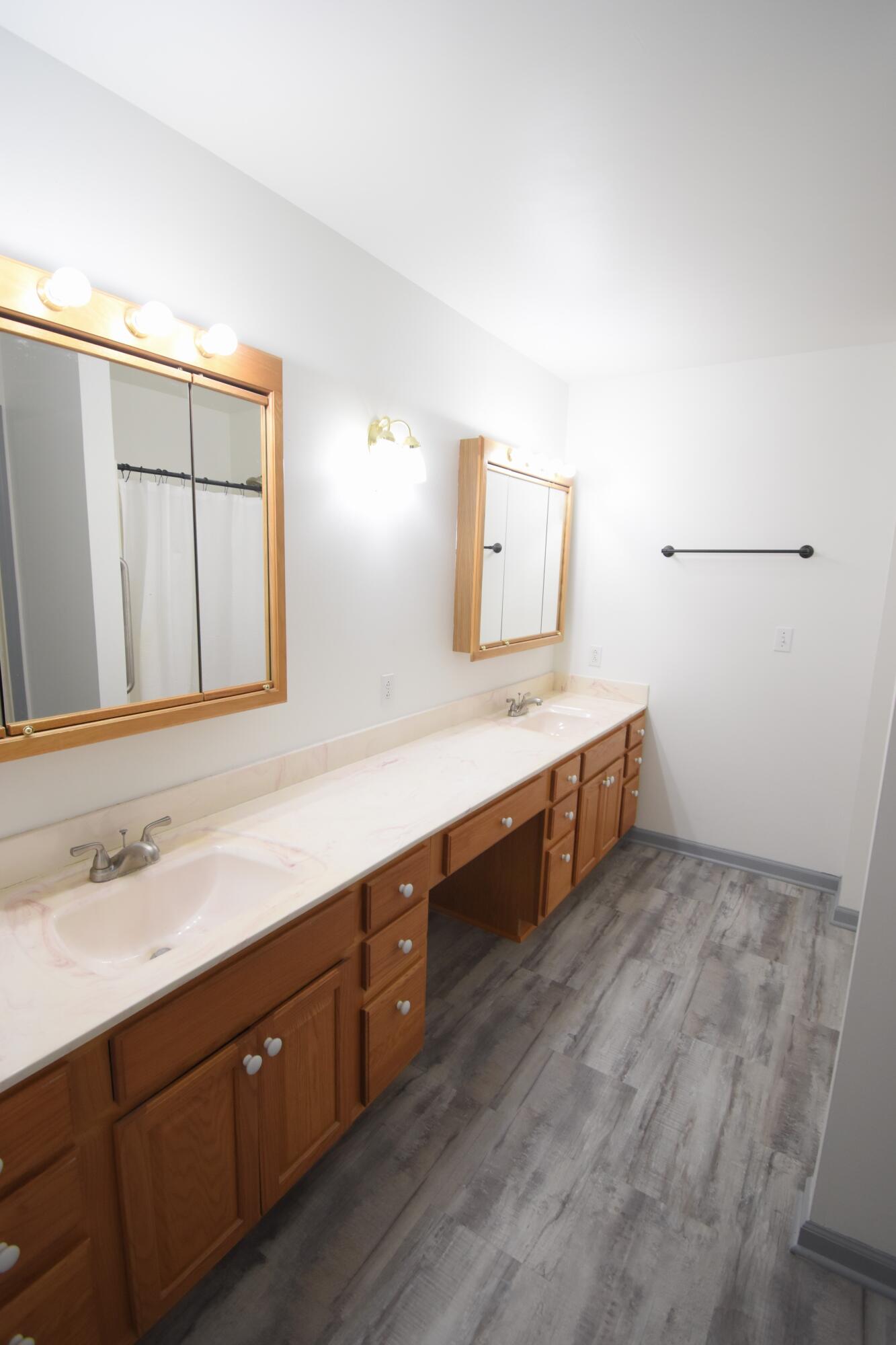 522 Pheasant Run Rensselaer, IN 47978 - Photo 38 of 55 a spacious bathroom with double vanity and a mirror