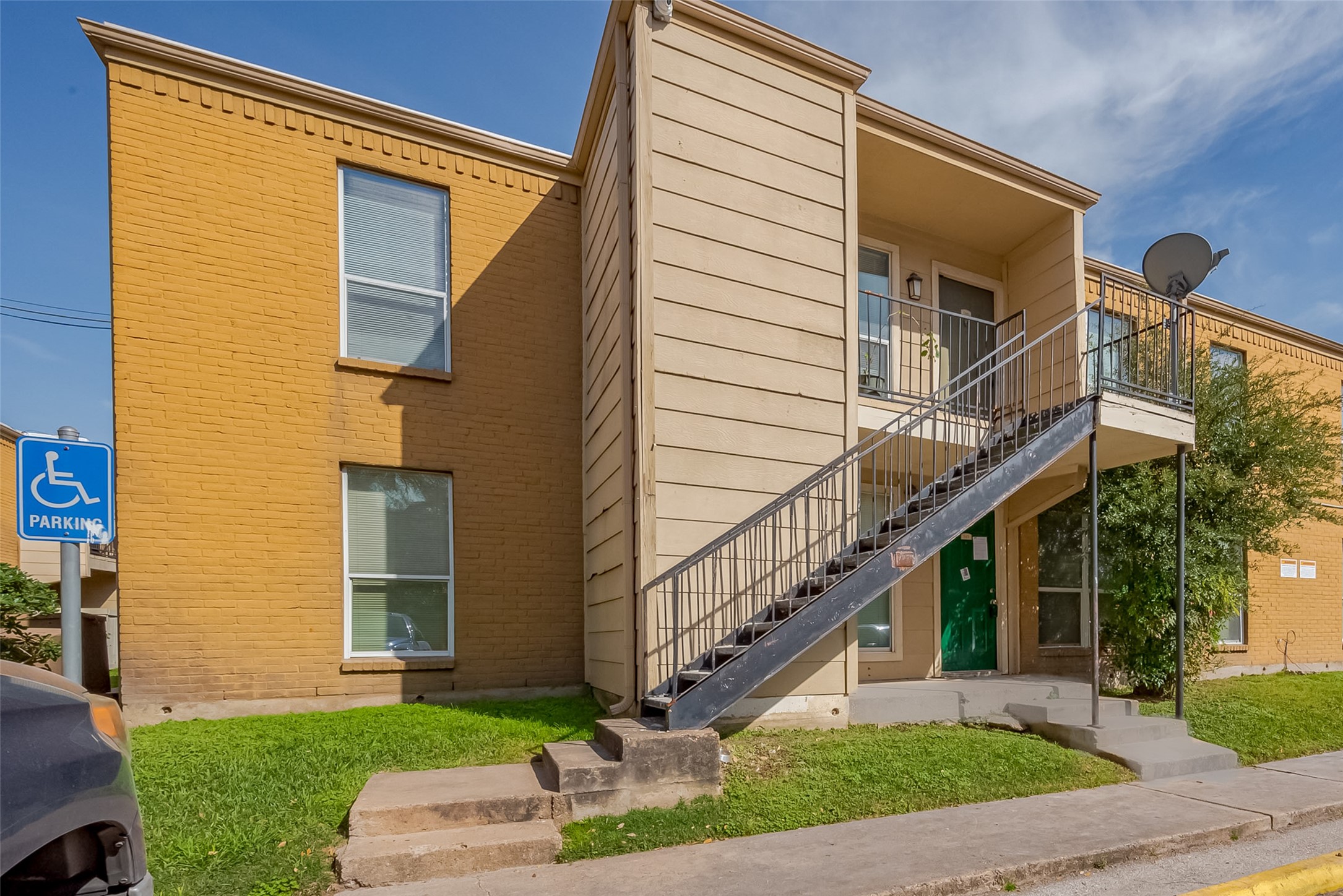 8100 Creekbend Drive, Unit 146 Houston, TX 77071 - Photo 4 of 17 a view of a house with a yard and stairs