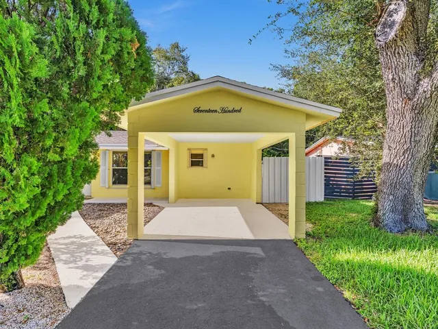 an aerial view of residential building and lake