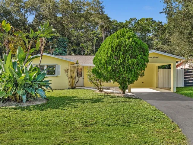 an aerial view of residential building and ocean