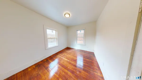 a view of an empty room and window