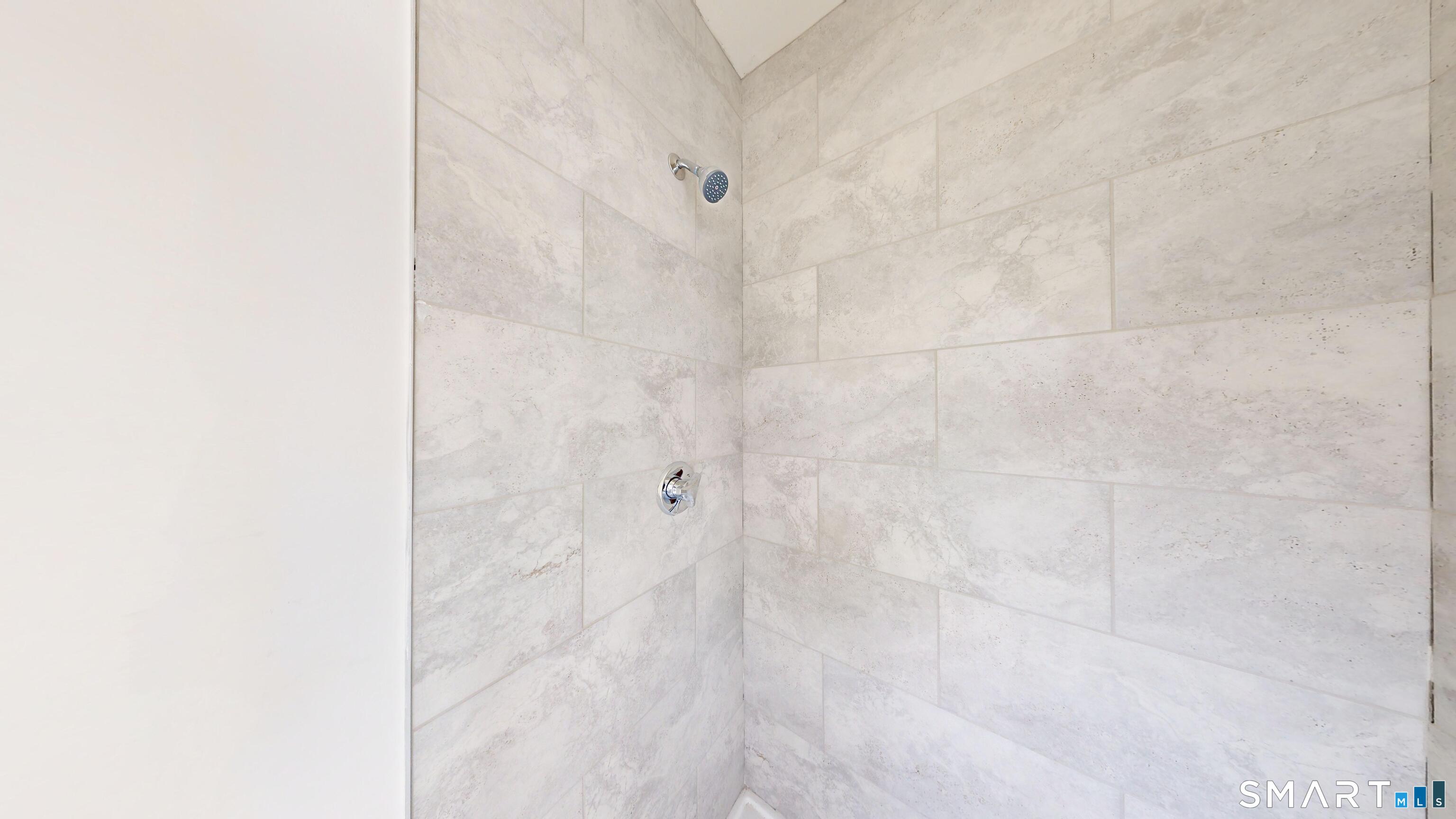 736 Main Street Windham, CT 06226 - Photo 7 of 12 a bathroom with a shower