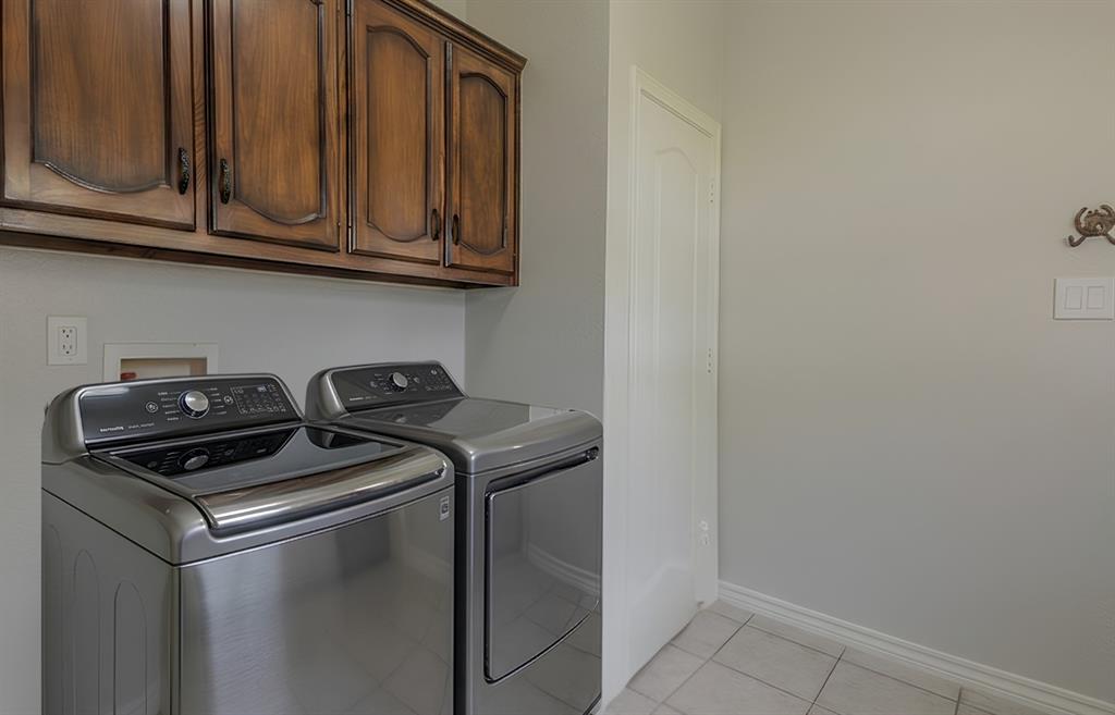 13507 Friendship Road Pilot Point, TX 76258 - Photo 18 of 39 a stove top oven sitting inside of a kitchen