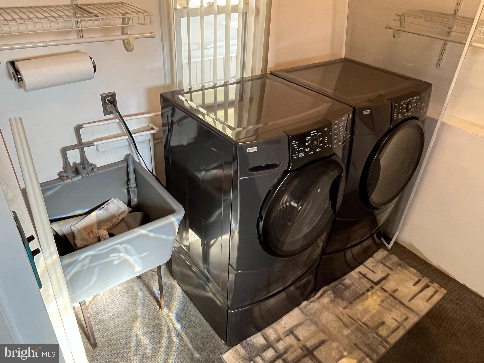 509 Larkspur Street Philadelphia, PA 19116 - Photo 12 of 15 a utility room with dryer and washer
