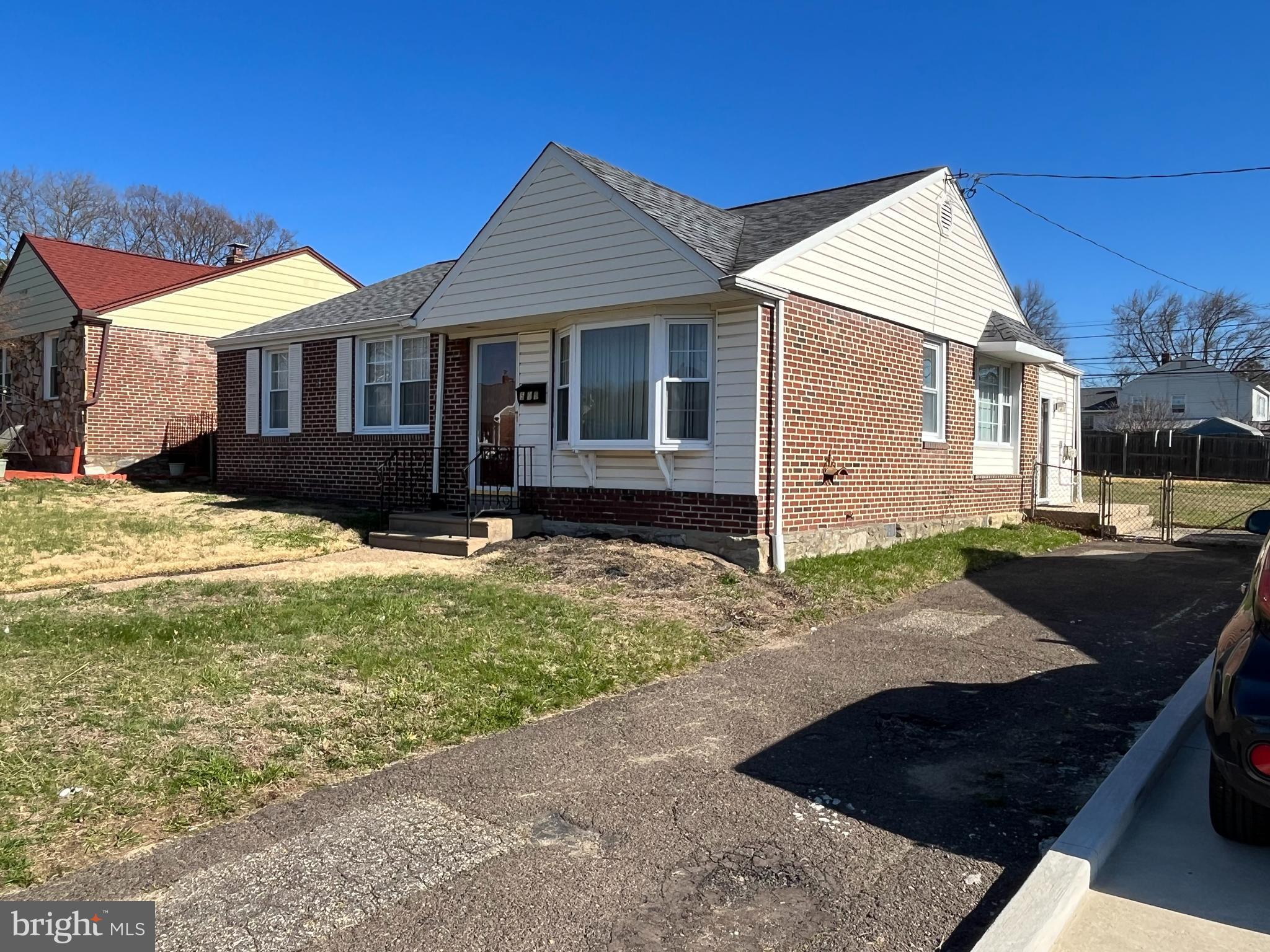 509 Larkspur Street Philadelphia, PA 19116 - Photo 3 of 15 a front view of a house with a yard