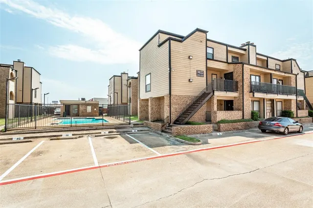 a view of street with parked cars