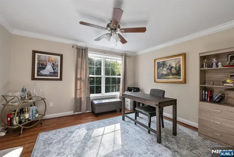 a work room with furniture and windows