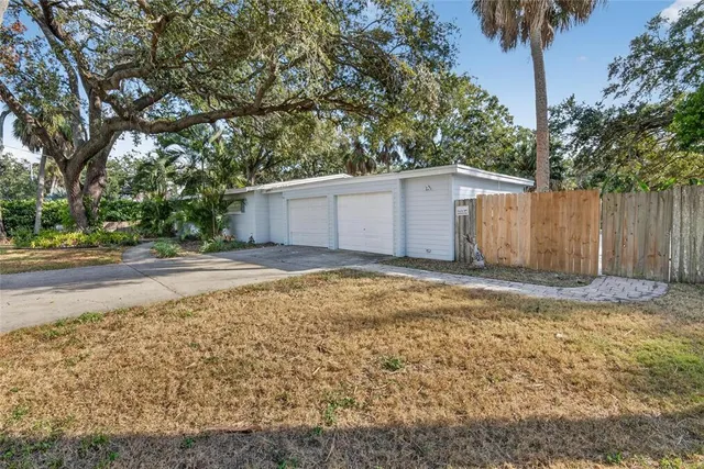 a view of a kitchen with a sink and a stove