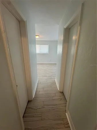 a view of a hallway from a hallway