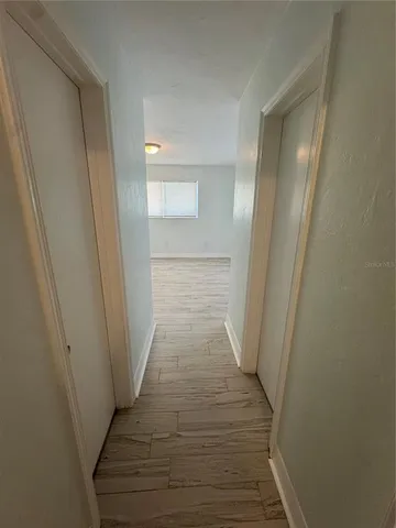a view of a hallway from a hallway