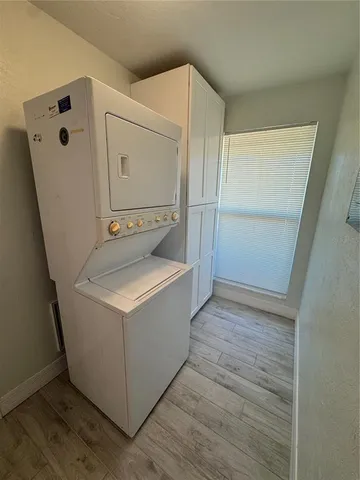a utility room with washer and dryer