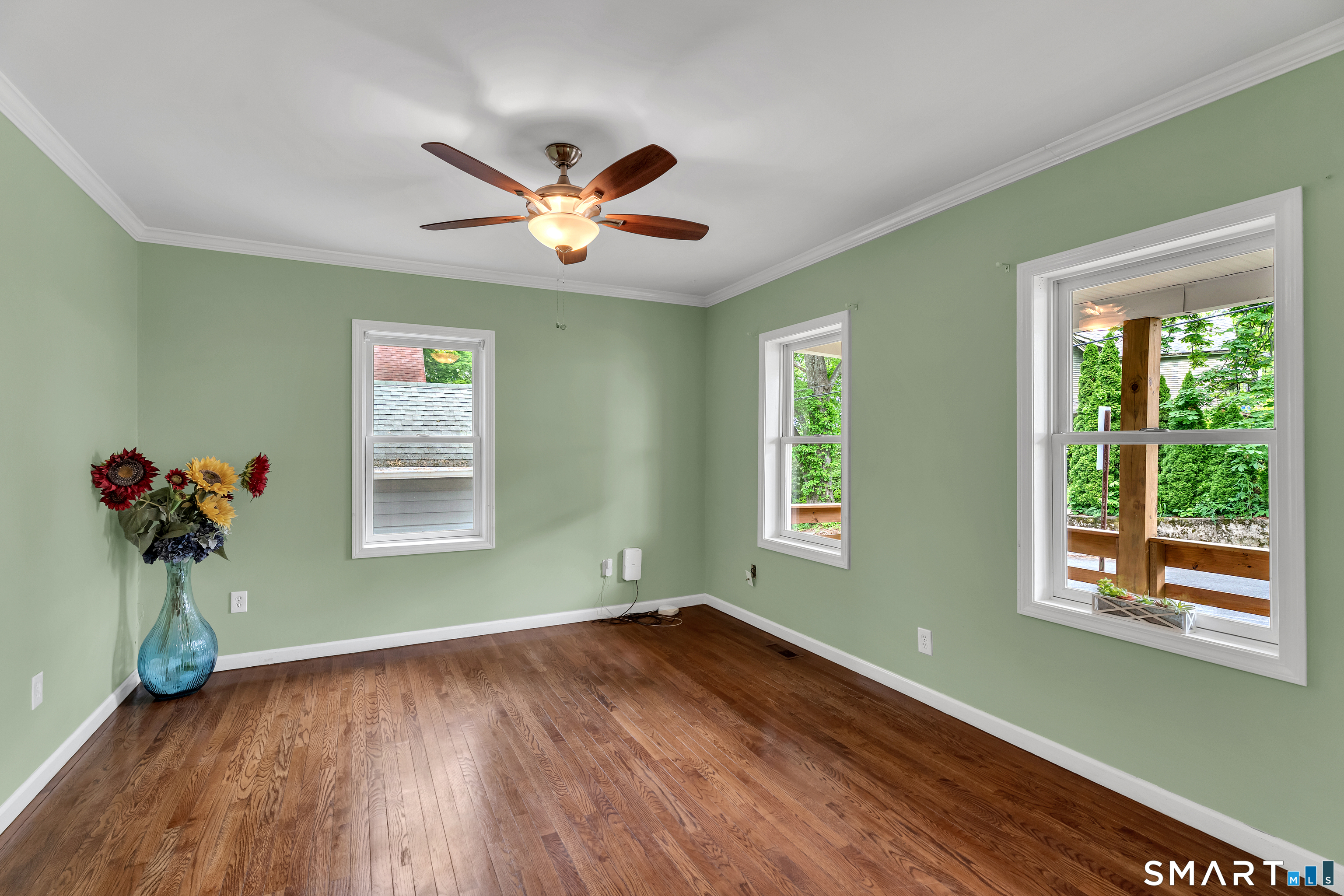 75 Summit Street Norwich, CT 06360 - Photo 11 of 40 a view of a room with wooden floor and a window