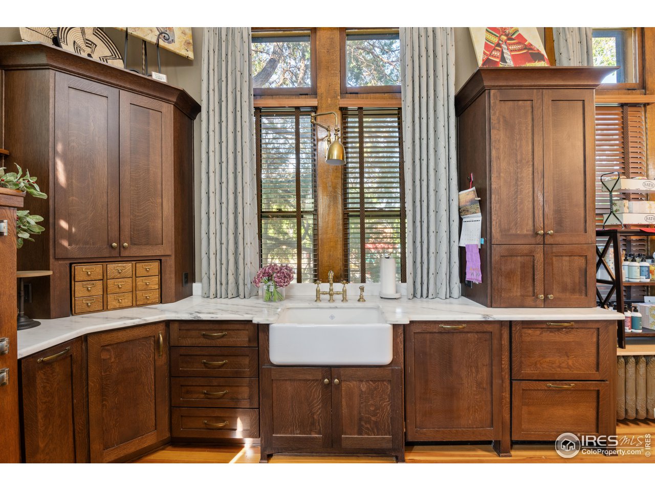 210 South 4th Street Sterling, CO 80751 - Photo 14 of 50 Abundance of cabinets, a farm sink and refrigerated drawers