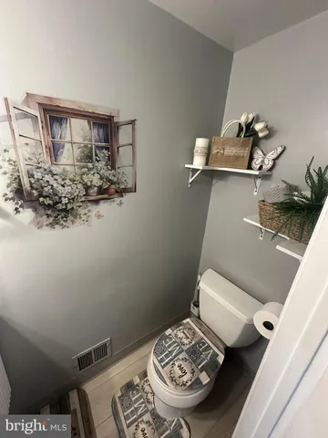 a view of a workspace with furniture