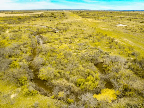 a view of a swimming pool and an ocean