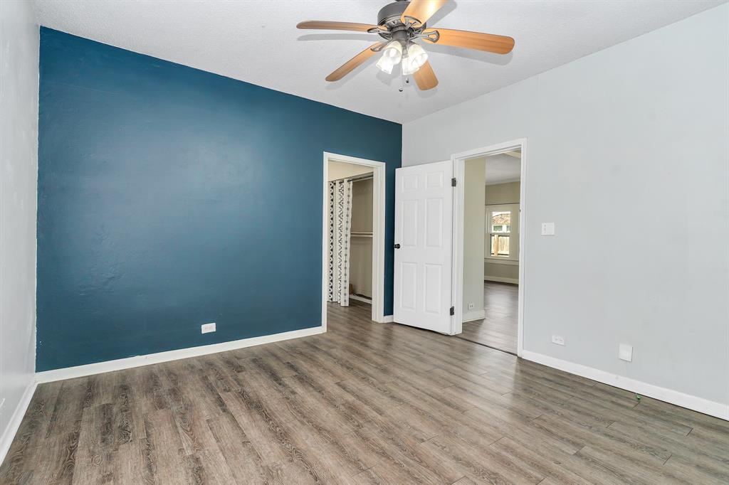 914 Prairie Avenue Cleburne, TX 76033 - Photo 15 of 19 a view of an empty room with wooden floor