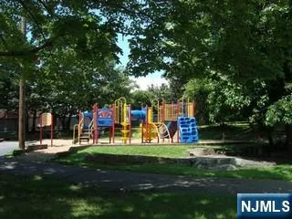a view of a swimming pool with an outdoor seating