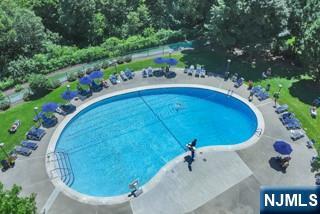 5 Horizon Road, Unit 2304 Fort Lee, NJ 07024 - Photo 31 of 33 a view of a swimming pool with an outdoor seating