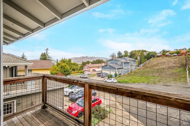 a view of a glass door and a balcony