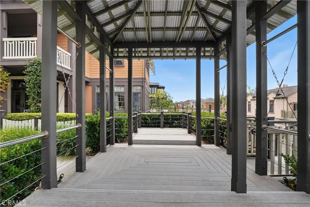 a view of a house with a flower garden