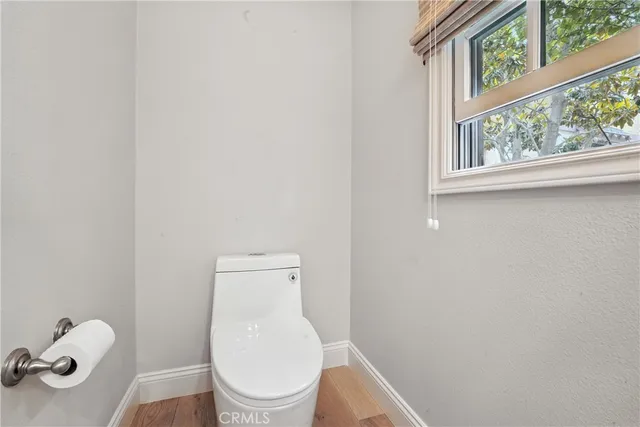 a spacious bedroom with a bed and walk in closet